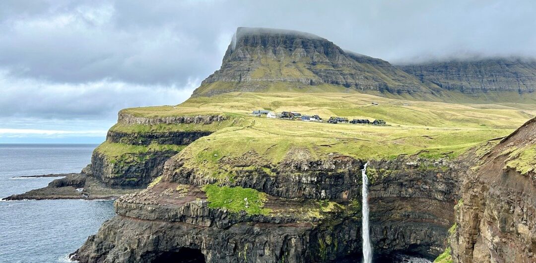 5 Travel Locations to Add to Your Bucket List 3 5 Travel Locations to Add to Your Bucket List - Mullafossur Waterfall, Faroe Islands