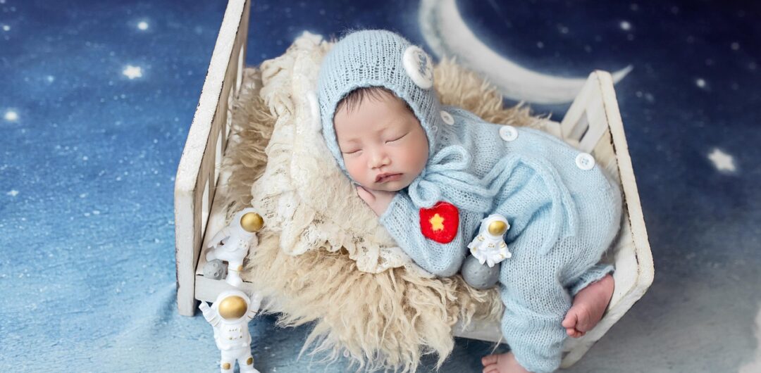 Helping Baby Sleep Longer - Astronaut Baby Sleeping in Tiny Bed