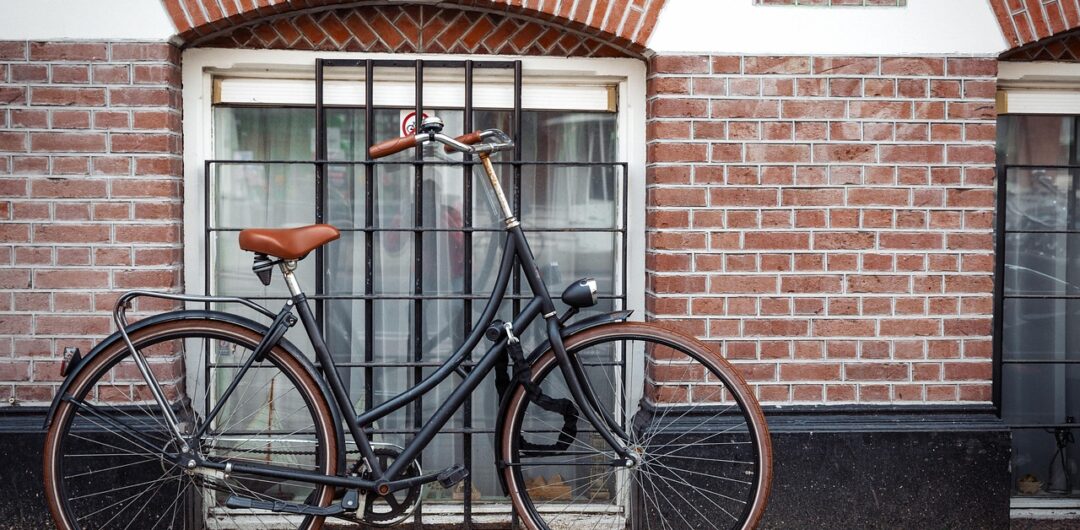 7 Ways to Modernize an Older Home Without Losing Character 6 How to Modernize an Older Home Without Losing Character - Bike in Front of Window