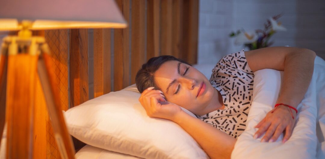 How to Squeeze Self-Care Into Your Day When Life Gets Busy - Woman Sleeping in Bed