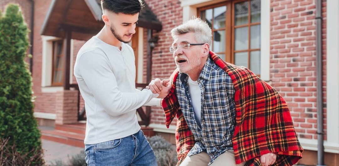 How to Travel with Someone in a Wheelchair? 5 How to Travel with Someone in a Wheelchair - Young Man Helping Older Man With Wheelchair