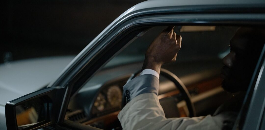 The Emotional Design of Car Interiors Why We Bond With Spaces - Man Resting Arm on Car Window