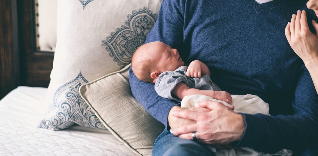 What To Do After Bringing Your Beloved Baby Home From The Hospital - Parents Looking at Sleeping Baby
