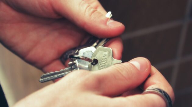 Why Vacancy Costs More than Most Landlords Expect - Hands Holding Keys