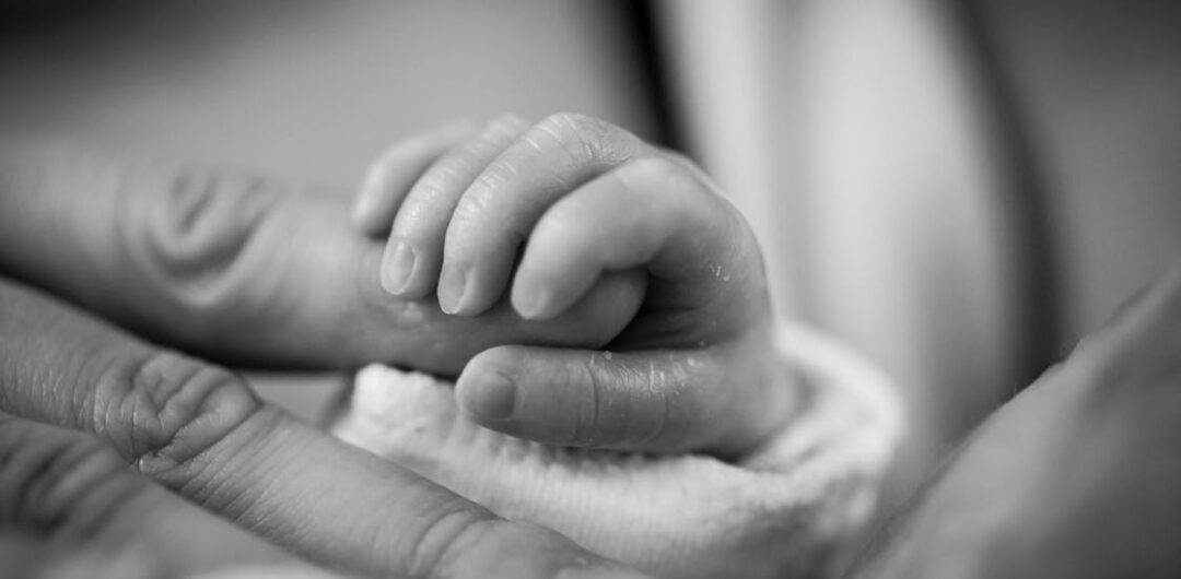 What To Do After Bringing Your Beloved Baby Home From The Hospital - Baby Holds Onto Finger