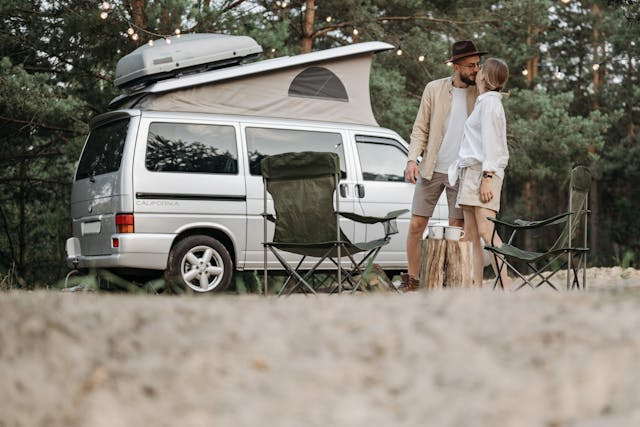 Love Adventure? Here’s Why You Should Buy an RV 1 Love Adventure? Here’s Why You Should Buy an RV - Couple in Front of Camping Fan