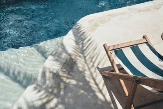 How to Ensure You Have the Relaxing Holiday You Deserve - Chair by Pool