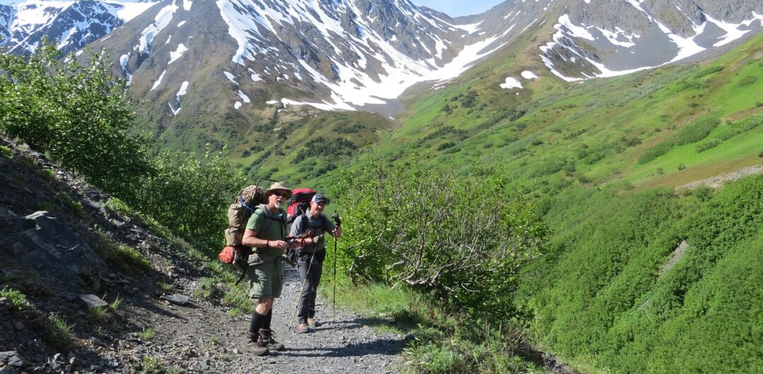 9 Reasons Alaska Should Be At The Top Of Your Travel Wish List - Two People Hiking in Alaska