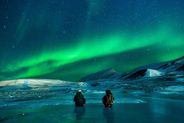 9 Reasons Alaska Should Be At The Top Of Your Travel Wish List - People Watching the Aurora Borealis in Alaska