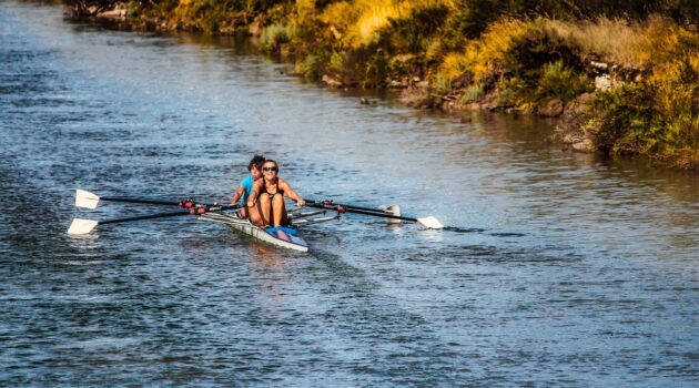 Dive Into These 3 US Cities If You Love Water Sports - Women in a Row Boat