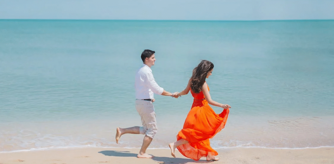 Stop Planning Dates and Start Sharing Days with These 5 Easy Tips - Couple Walking on the Beach