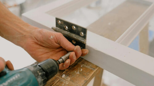 Hammer or Hire? The Homeowner’s Guide to DIY Decisions - Attaching Hinge
