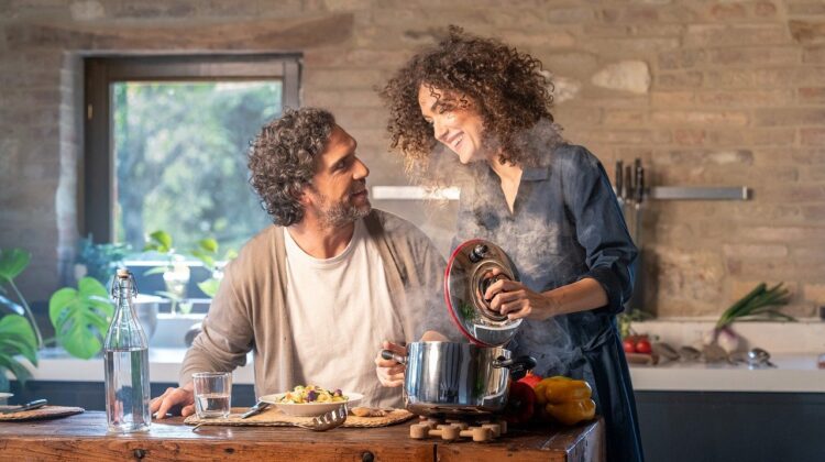 3 Ways To Recreate The Restaurant Experience At Home - Couple Cooking at Home